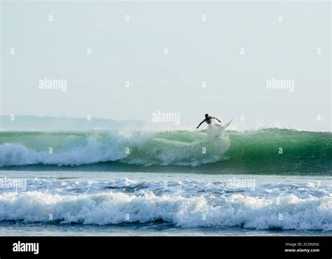 Surfing on Bali Stock Photo - Alamy