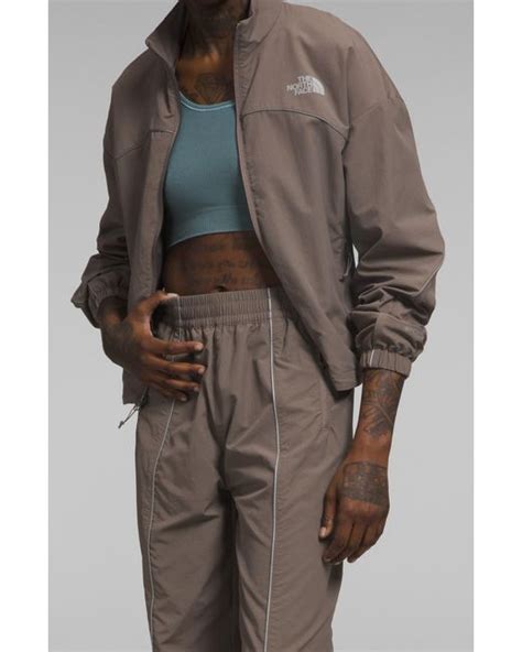 The North Face Tek Piping Wind Jacket In Gray Lyst