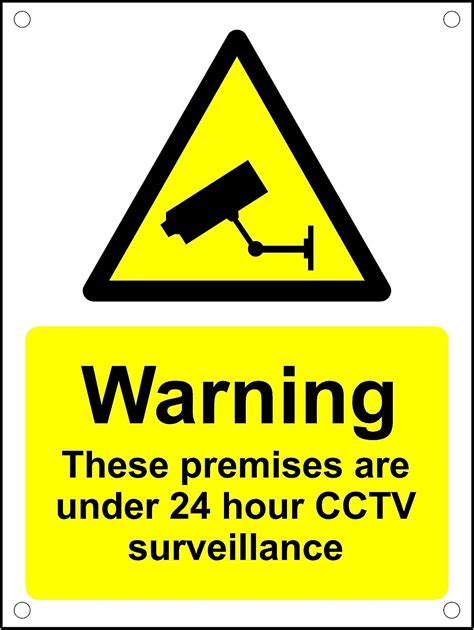 Warning These Premises Are Under Hour Cctv Surveillance A Pre