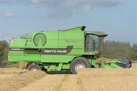 Deutz Fahr 5660 HTS Combine Harvester Cutting Spring Barley A Photo