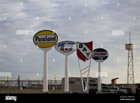 4 vintage gas stations signs Stock Photo - Alamy