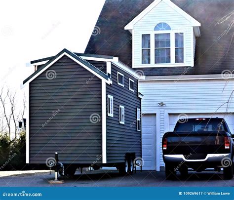 Tiny House Big Garage stock image. Image of small, friendly - 109269617