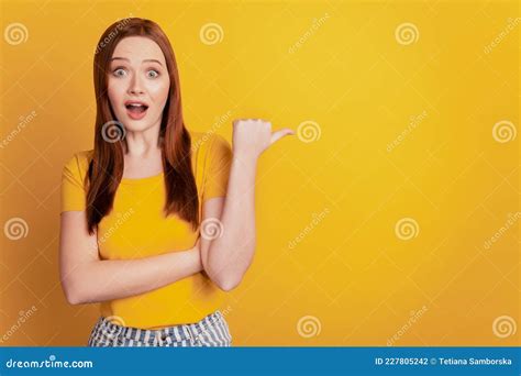 Photo Of Shocked Girl Promoter Point Thumb Finger Copy Space Isolated