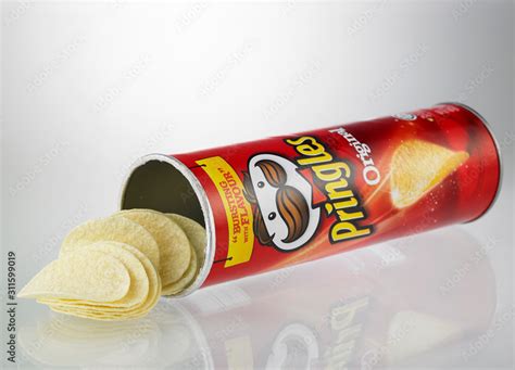 original Pringles potato chip on the white background Stock Photo | Adobe Stock