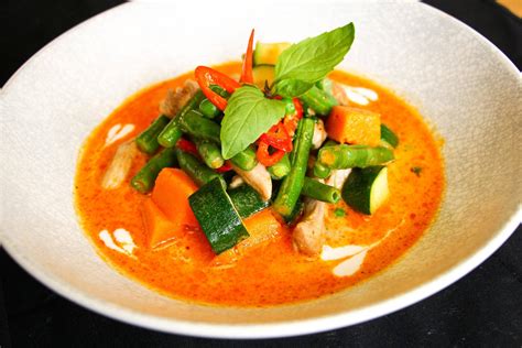 Download Red Thai Curry With Artistic Plating Wallpaper