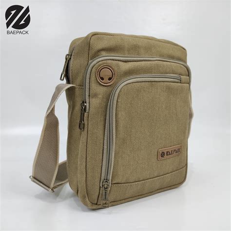 Jual Tas Selempang Kanvas Cowok Dengan Lubang Headset Argo Cream