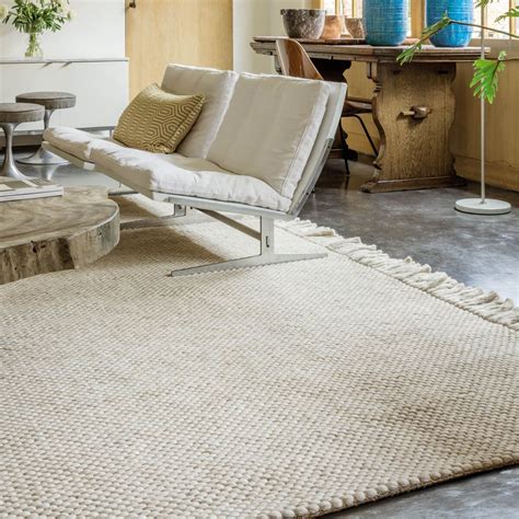 étonnant tapis beige laine