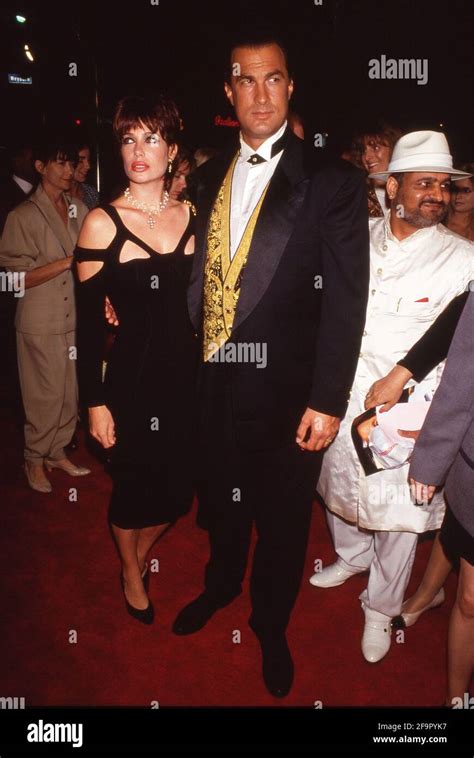 Kelly LeBrock and Steven Seagal attending the premiere of 'Under Siege ...