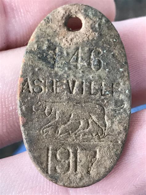 1917 Asheville NC dog tag found in the front yard of my sister’s 1923