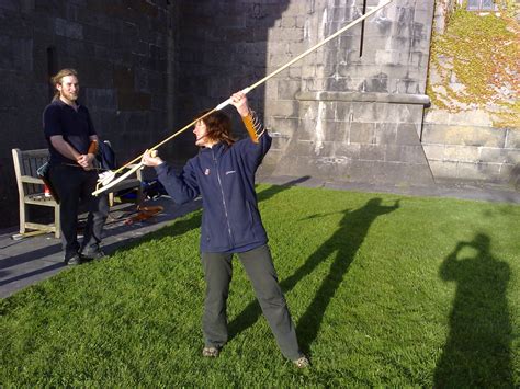 File:Poised to launch a dart from an atlatl.jpg - Wikimedia Commons