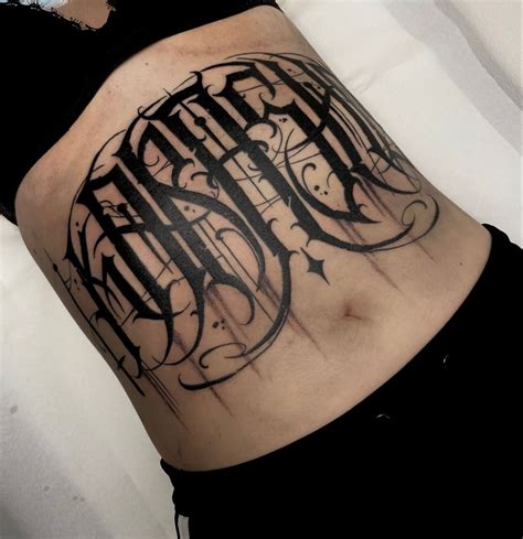 Stomach Lettering Tattoo Gothic