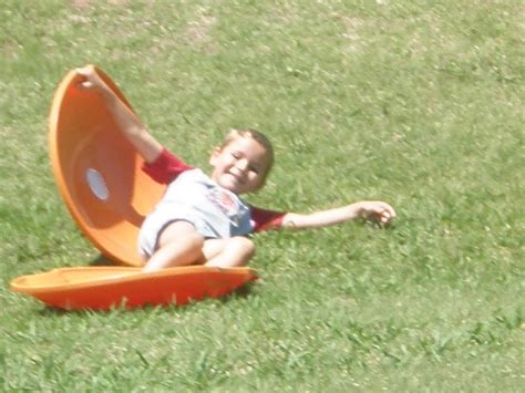 The Wolfe Den Grass Sledding