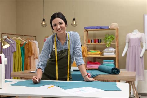 Dressmaker Marking Fabric With Chalk In Workshop Stock Image Image Of