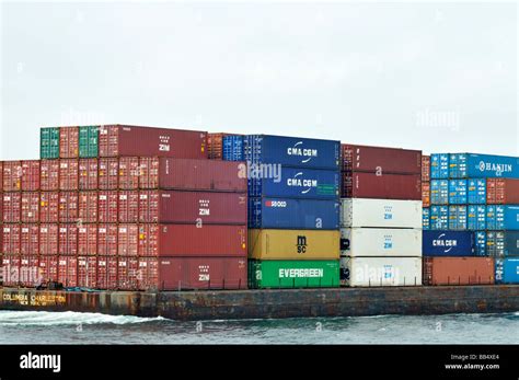 Container barge loaded with shipping containers in ocean USA Stock ...