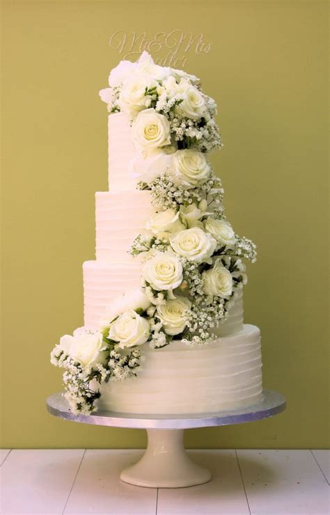 Buttercream Ridges Cake With White Fresh Flower Cascade Bay Tree Cakes