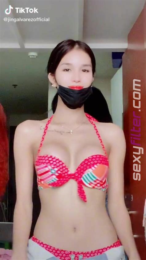 Sexy Jing Alvarez Shows Cleavage In Bikini Top And Bouncing Breasts