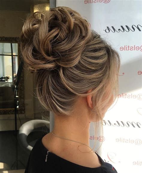 2024 Popular High Volume Donut Bun Updo Hairstyles