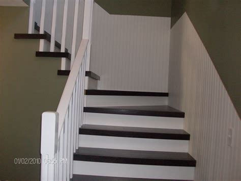 Hardwood Solutions Lethbridge: Dark walnut stained oak stairs