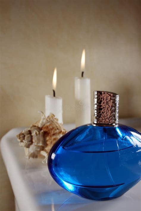 Perfume in blue bottle stock photo. Image of bathroom - 4101922