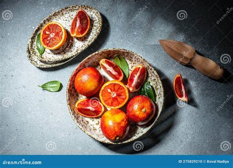 Sicilian Blood Juicy Oranges Whole And Cut Sliced Halved With Leaves