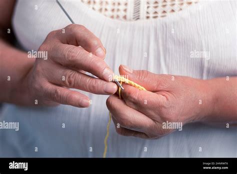 Elderly Woman 60 Year Old Latin Grandmother Knitting Happy And