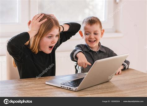 Kids Playing On Computer Stock Photo By ©bnenin 165995504