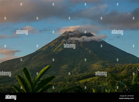 Arenal Volcano With Clouds In Arenal National Park La Fortuna Town Of