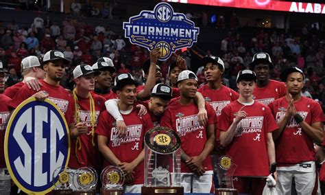 Alabama basketball celebrates winning the SEC Tournament Championship