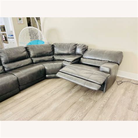 Black Leather Reclining Sectional - AptDeco