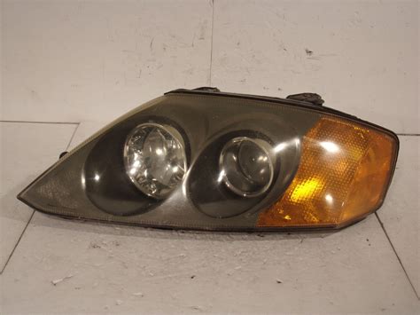 Hyundai Tiburon Driver Side Left Headlight Lamp Lens