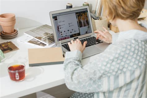 Working Woman in White Long Sleeve Shirt · Free Stock Photo