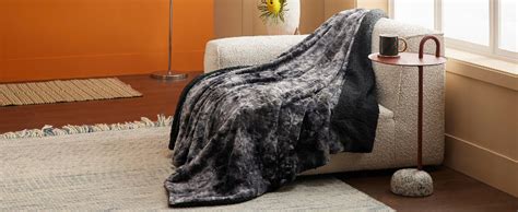 Bedsure Plaid Fausse Fourrure Noir Polaire Canape Poil Long