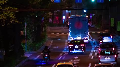 A Night Timelapse Of The Traffic Jam At The City Street In Tokyo