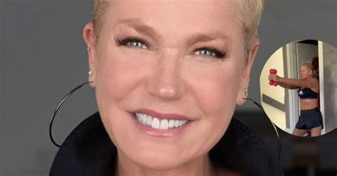 Xuxa pega pesado em treino deixa barriga sarada à mostra e ganha