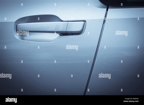 Car door handle Stock Photo - Alamy