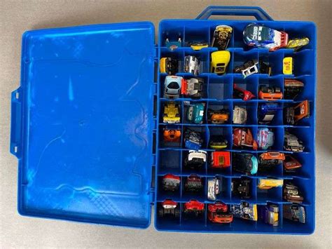 Group Of Hotwheels Carrying Cases With Cars Matthew Bullock Auctioneers