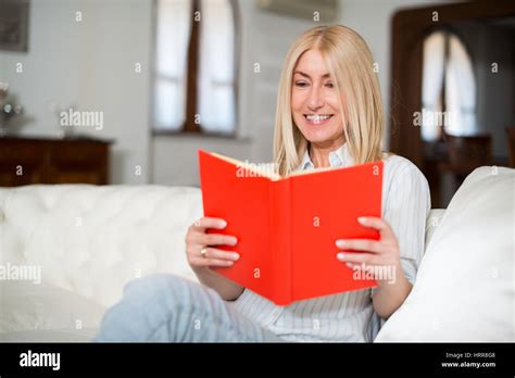 Mature Woman Reading A Book Stock Photo Alamy