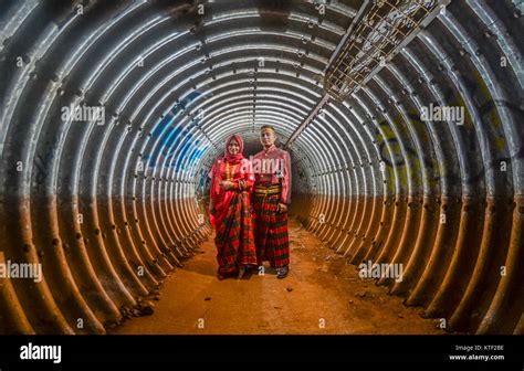 A Couple In Traditional Bugis Dress In A Tunnel Bugis Is One Of The