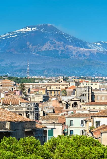 Premium Photo | View of the historic centre of catania with etna volcano in the background ...