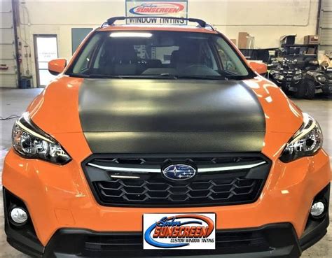 Carbon Fiber Vinyl Wrap Installation On Hood Of A Subaru Crosstrek