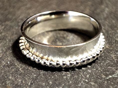 Sterling Silver Aurora Spinning Ring With Aurora Borealis Cubic Zirconia