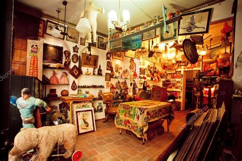 Antique shop with second hand furniture, toys, books and art-objects – Stock Editorial Photo ...