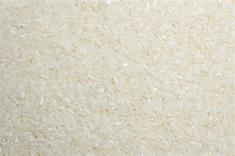 Premium Photo Dry Uncooked White Rice Background