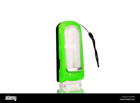 One battery operated flashlight, close-up, isolated on a white ...