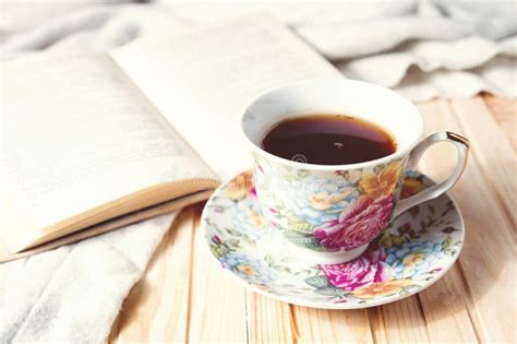 Cozy Home Still Life Cup Of Hot Coffee Or Tea And Opened Book With