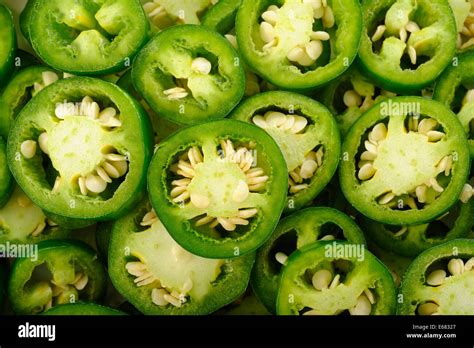 Sliced Green Jalapeno Peppers Background Stock Photo Alamy