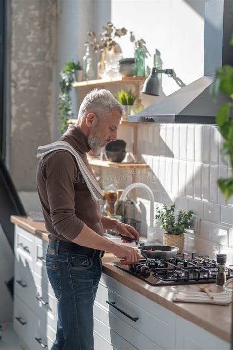 Man Standing Near The Stove And Frying Something Stock Image Image Of