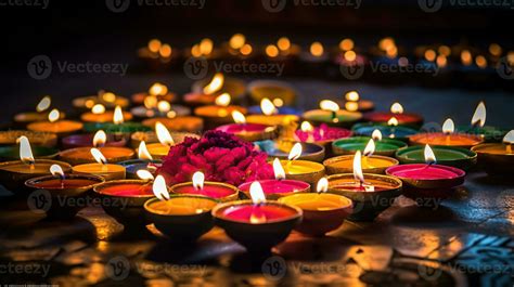 Oil lamps lit on colorful rangoli during diwali celebration, generative ...