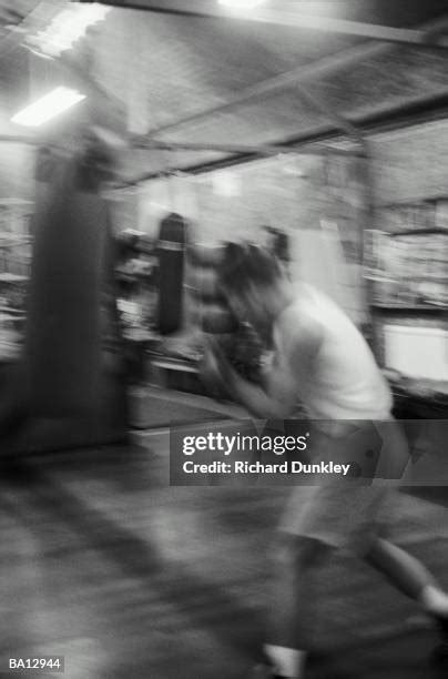 Boxing Heavy Bag Workout Photos and Premium High Res Pictures - Getty ...