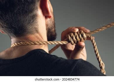 Man Pulls Noose Around His Neck Stock Photo 2024834774 | Shutterstock